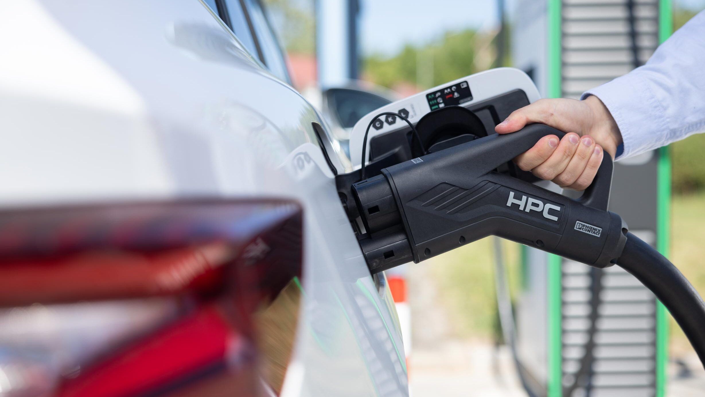 Unsere Energie kann Elektroauto wird aufgeladen