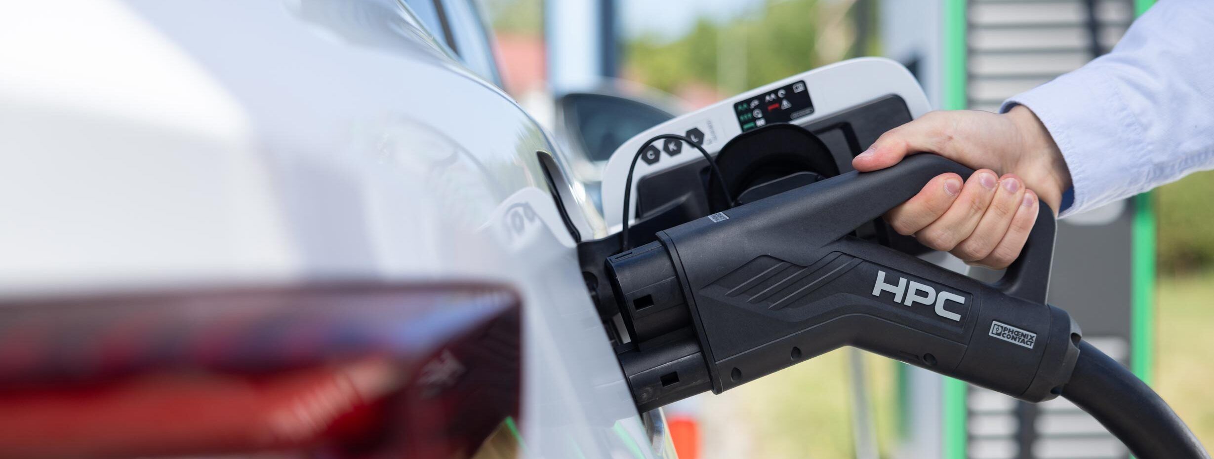 Unsere Energie kann Elektroauto wird aufgeladen